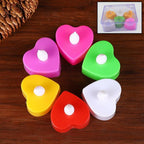 Pack of 6 multicolor LED tealights glowing softly, ideal for festive home decoration.