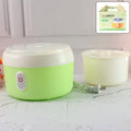 Green electric yogurt maker on a kitchen counter, ready to make homemade curd.