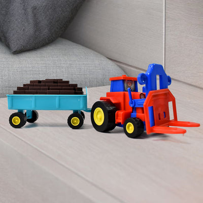 Vibrant yellow friction tractor toy with a red bricks trolley, ready for imaginative play.