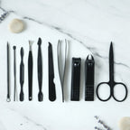 Manicure kit featuring precision cutters and nail grooming tools