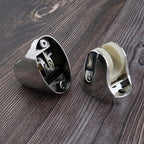 Flexible shower holder with fixing screws, ready for easy installation.