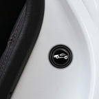 Car door shock absorber sticker discreetly applied to a car door edge.