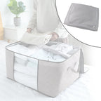 Storage box with window neatly organizing sarees and quilts inside wardrobe