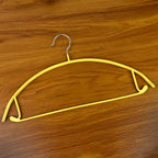 Slim metal hanger with space-saving design for clothes organization