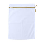 Compact mesh bag ideal for organising clothes during travel.