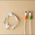 A mini utility hanger holding a small cloth, demonstrating its secure anti-slip hold.
