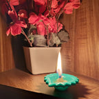 Empty silicone diya cups in various colours, ready for oil or tea lights.