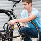 Compact and lightweight bike cable lock secured around bike frame