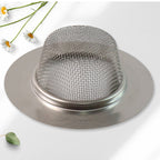 Fine mesh dome hair catcher trapping hair and debris