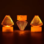 Battery-operated LED flameless candle lights in a set of four