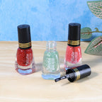 Mini nail polish bottle reflecting bright nail shine and sparkle