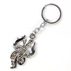Keychain showcasing spiritual Trishul and Damru symbols with silver finish