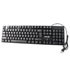 Person typing comfortably on the Wired USB Keyboard at a home office desk setup.