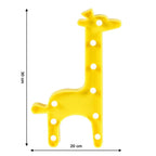 Close-up of LED decorative light shaped as a giraffe silhouette
