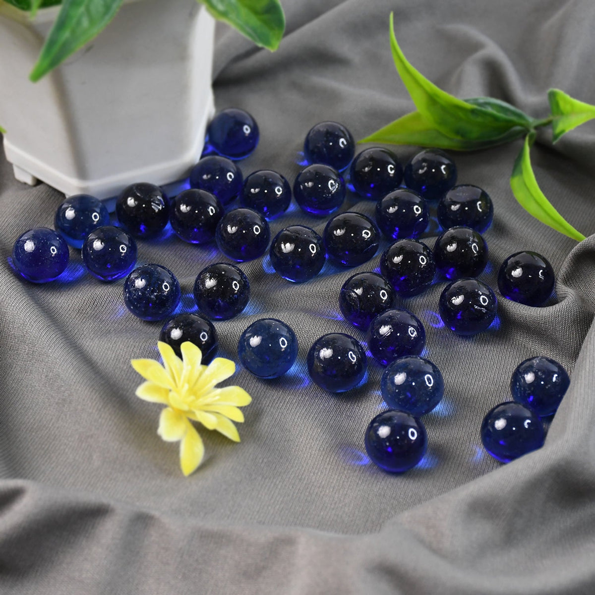 Glow in the dark decorative pebbles creating a vibrant fish tank landscape.