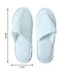 Disposable hotel guest slippers neatly packaged for convenience