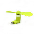 Small Mini USB fan in hand, ready for on-the-go cooling.