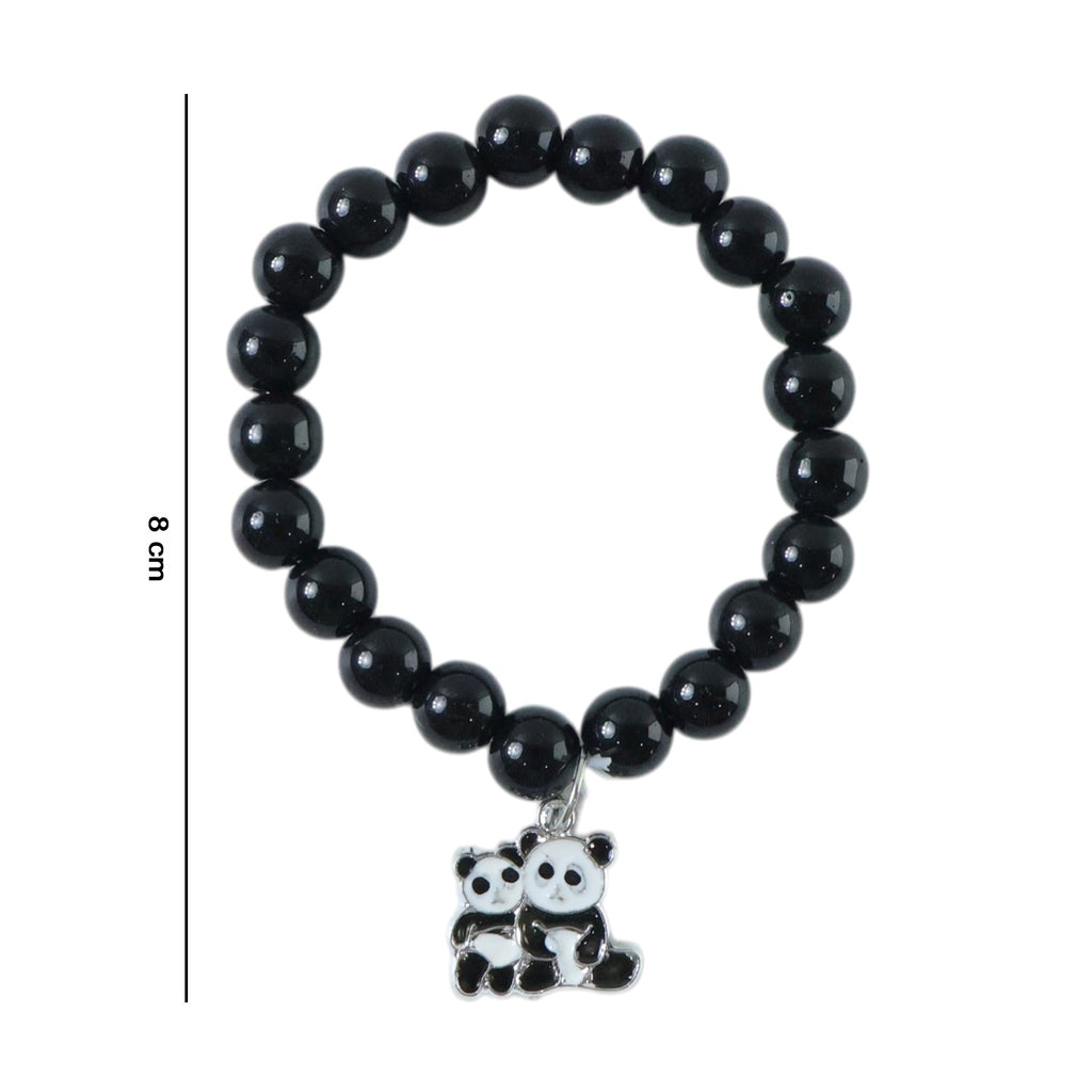 Stylish pastel bead stretch bracelet laid flat highlighting glossy finish and charm