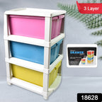 Multi-purpose plastic storage cabinet neatly organizing office supplies on a desk.