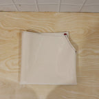 Person wearing waterproof apron while cooking in kitchen