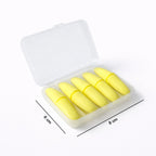 Pair of soft foam ear plugs displayed for noise reduction use