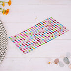Assorted sparkling crystal stickers applied to a phone case and other craft items.