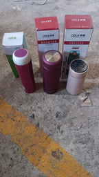 Group of assorted stainless steel insulated water bottles for travel