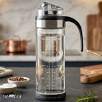 Glass oil dispenser bottle with handle and flip lid for kitchen