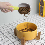 Close-up of the durable pet food scoop showing its food-grade ABS material.