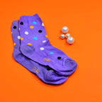 A collection of comfortable and stylish printed socks displayed in a flat lay.