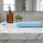 Toothbrush on bathroom counter demonstrating portability