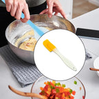 Silicone cooking spatula angled view showing handle and spatula head