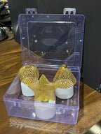 A single flameless LED candle shown in hand for scale and detail.