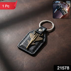 Leather finish keychain featuring metal aircraft emblem and sturdy key ring