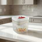 Compact food storage box with durable plastic and red lid