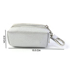 Compact key pouch showing textured exterior and zipper