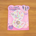 DIY kids jewelry craft kit with alphabet, flower, and crown beads