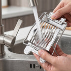 Egg slicer being used in kitchen