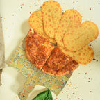 Packaged Maniarr's Pizza Mini Slim Bites with clear pizza flavour branding and nutritional info.