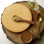 Close-up of a single round Plain Khakhra, showcasing its hand-roasted finish.