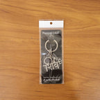Shiv design metal keychain in hand
