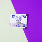 Single-use aqua face wash sachet providing a gentle foaming cleanser for daily use.