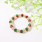 Glossy bead charm detail on multicolor stretch bracelet