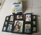 Close view of black photo frame set protecting artwork with acrylic fronts