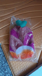 Hot water bottle bag showing durable rubber and protective soft cover