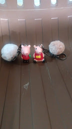 Mix design cartoon keychain featuring a fluffy pom pom accessory